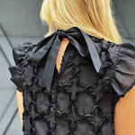 Ruffle Sleeve Tie Back Textured Top In Black - Infinity Raine