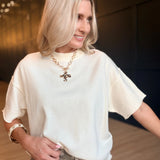 Lightweight Exposed Seam Short Sleeve Crop Sweater In Ivory
