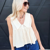 Deep V Button Down Slvless Peplim Top In Cream