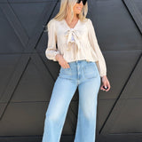 blu pepper Tops - Blouses Floral Eyelet Embroidery Front Tie Long Sleeve Top In Ivory