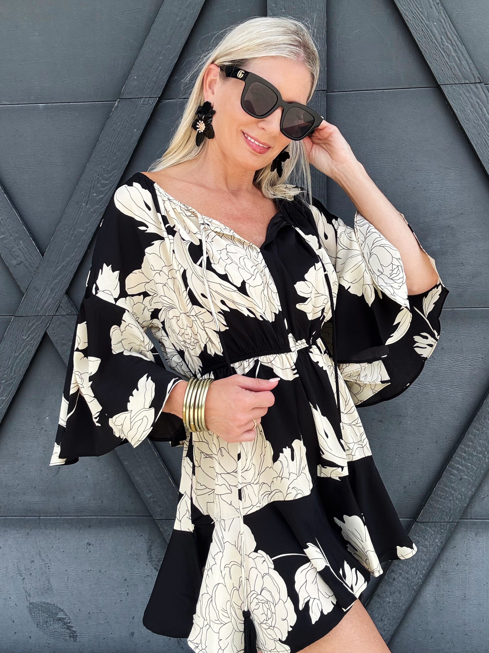 Floral Off Shoulder Bell Sleeved Romper In Black - Infinity Raine