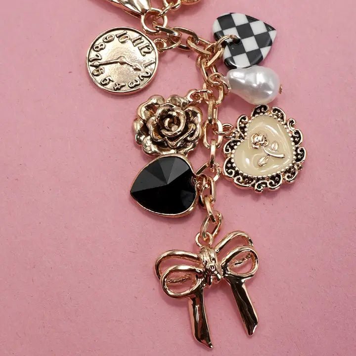 Bow Checker Heart Flower Bag Charm In Gold - Infinity Raine