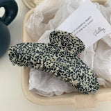 Sleek And Simple Claw Clip In Speckled