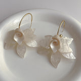 Chrome Flower Petal Dangle Earrings In White