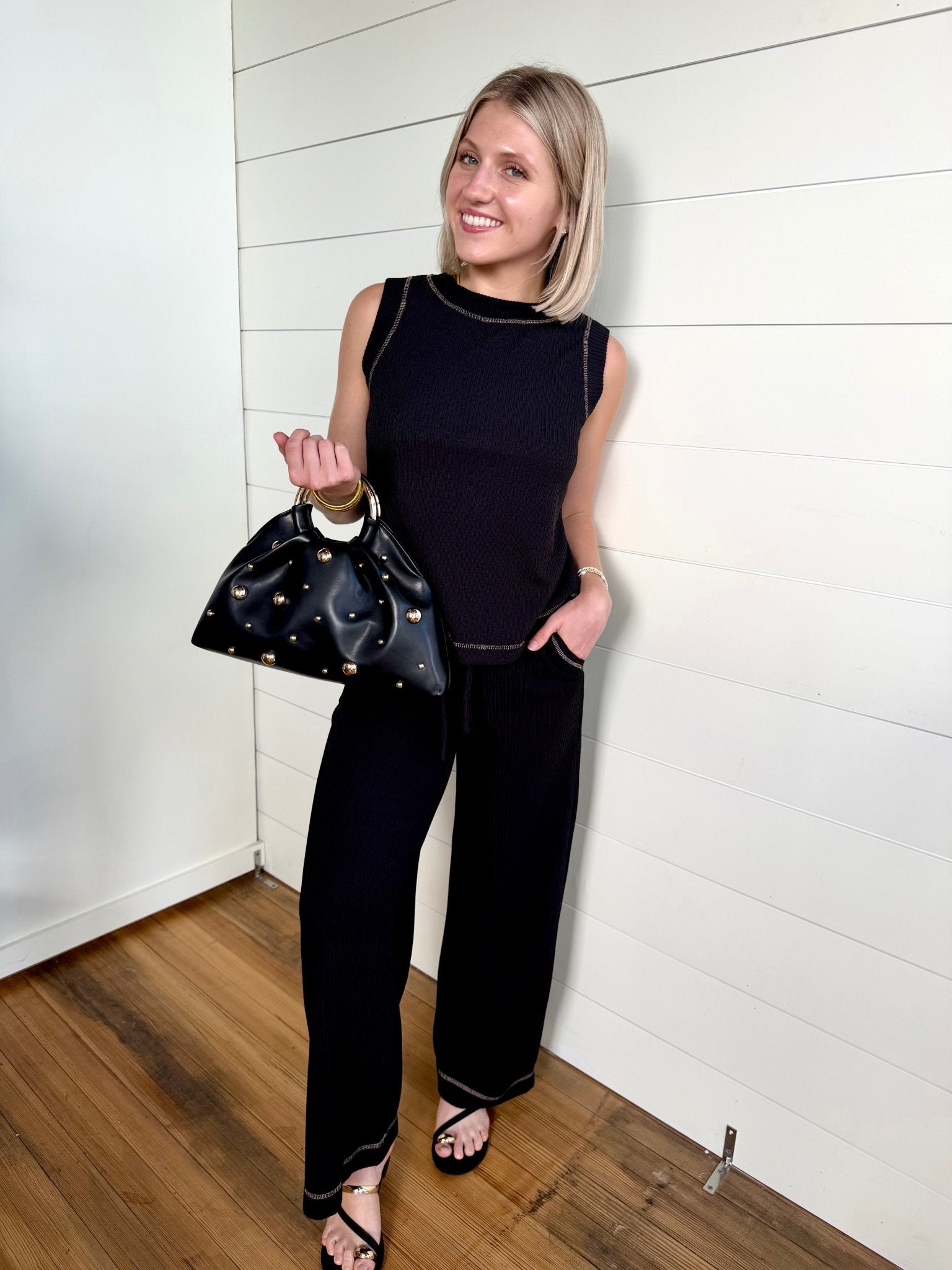 Back Button Detail Sleeveless Ribbed Knit Top In Black - Infinity Raine