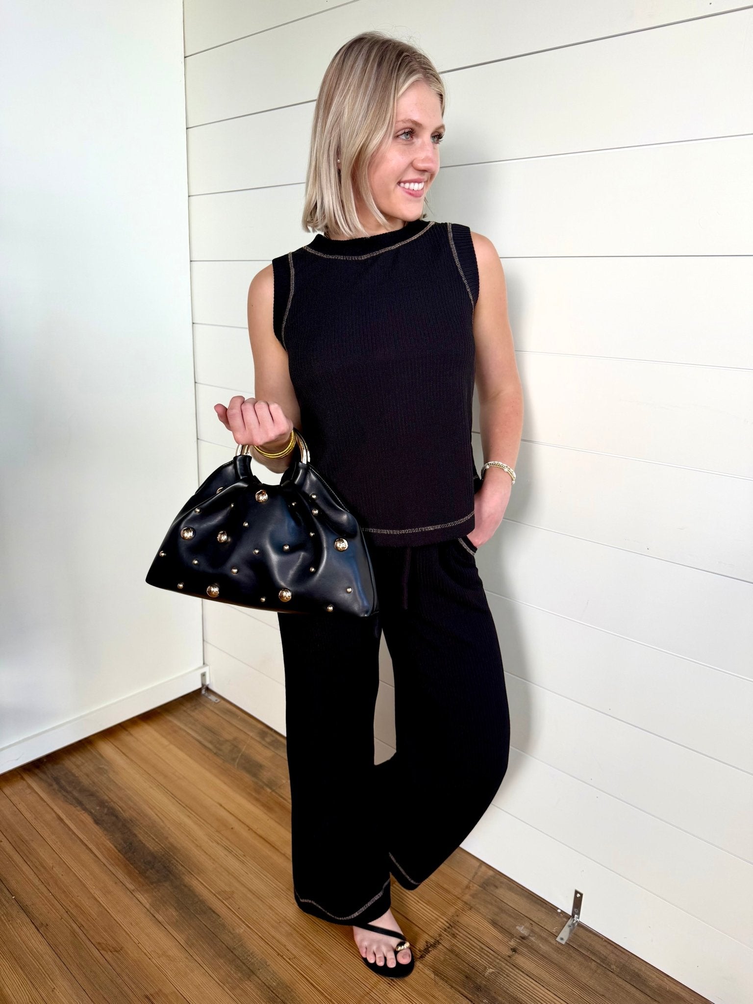 Back Button Detail Sleeveless Ribbed Knit Top In Black - Infinity Raine