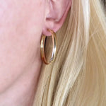 Hollow 40mm Hoops In Gold - Infinity Raine