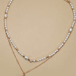 Layered Pearl Bow Necklace In Gold - Infinity Raine