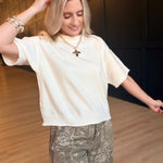 Lightweight Exposed Seam Short Sleeve Crop Sweater In Ivory - Infinity Raine