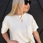 Ribbed Pocket Detail Knit Top In Ivory - Infinity Raine