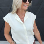 Round Neck Sleeveless Button Down Knit Cardigan in Ivory - Infinity Raine