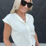 Round Neck Sleeveless Button Down Knit Cardigan in Ivory - Infinity Raine