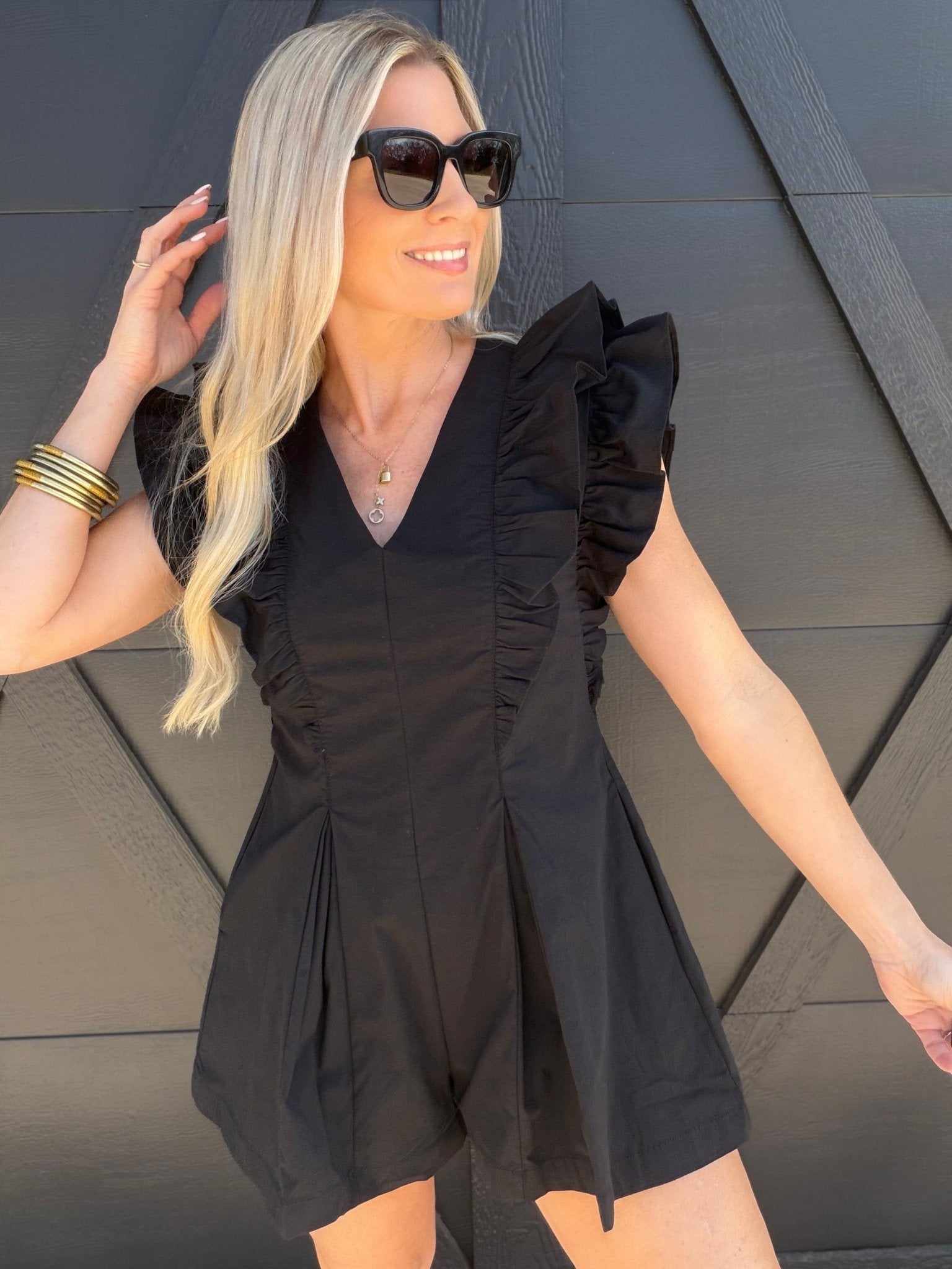 Ruffled V-Neck Pleated Romper In Black - Infinity Raine