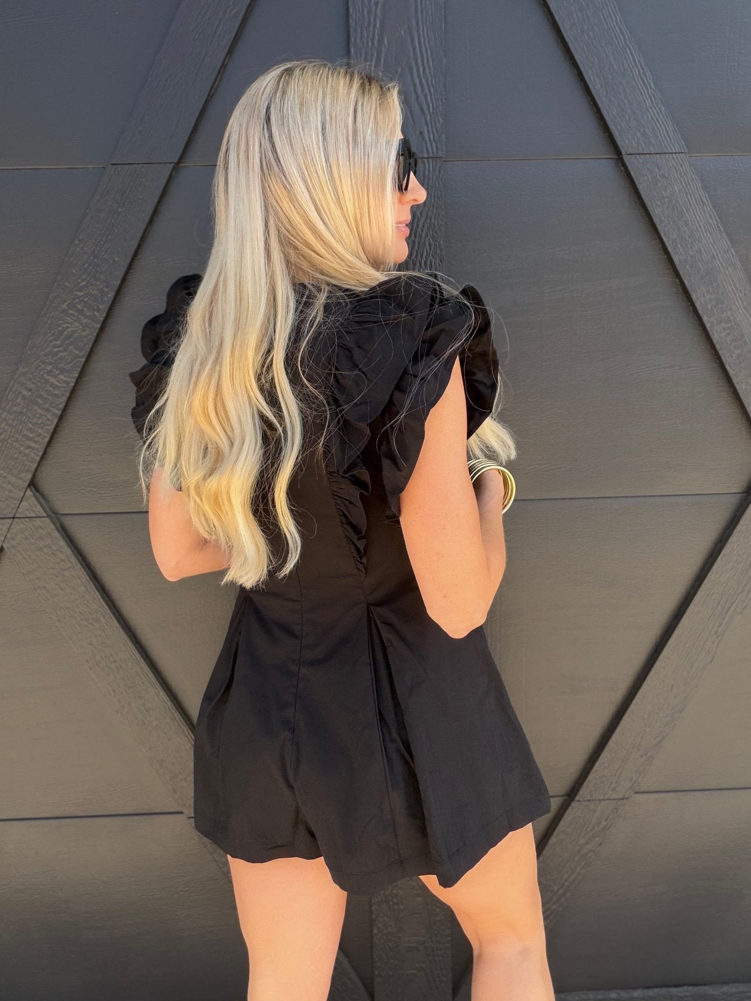 Ruffled V-Neck Pleated Romper In Black - Infinity Raine