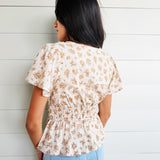 Split Neckline Short Bell Sleeve Shirred Waist Textured Floral Top - Infinity Raine