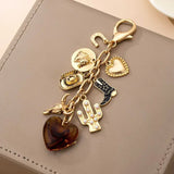 Western Heart Cross Hat Boot Heart Bag Charm In Gold - Infinity Raine