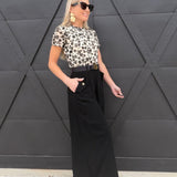 Wide-leg Flap Pocket Pants In Black - Infinity Raine